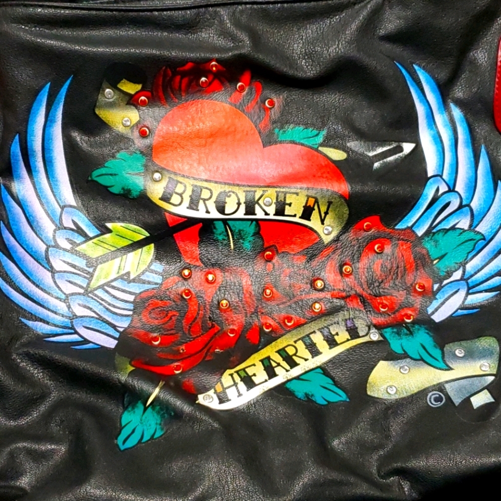 Gorgeous broken hearted leather bag